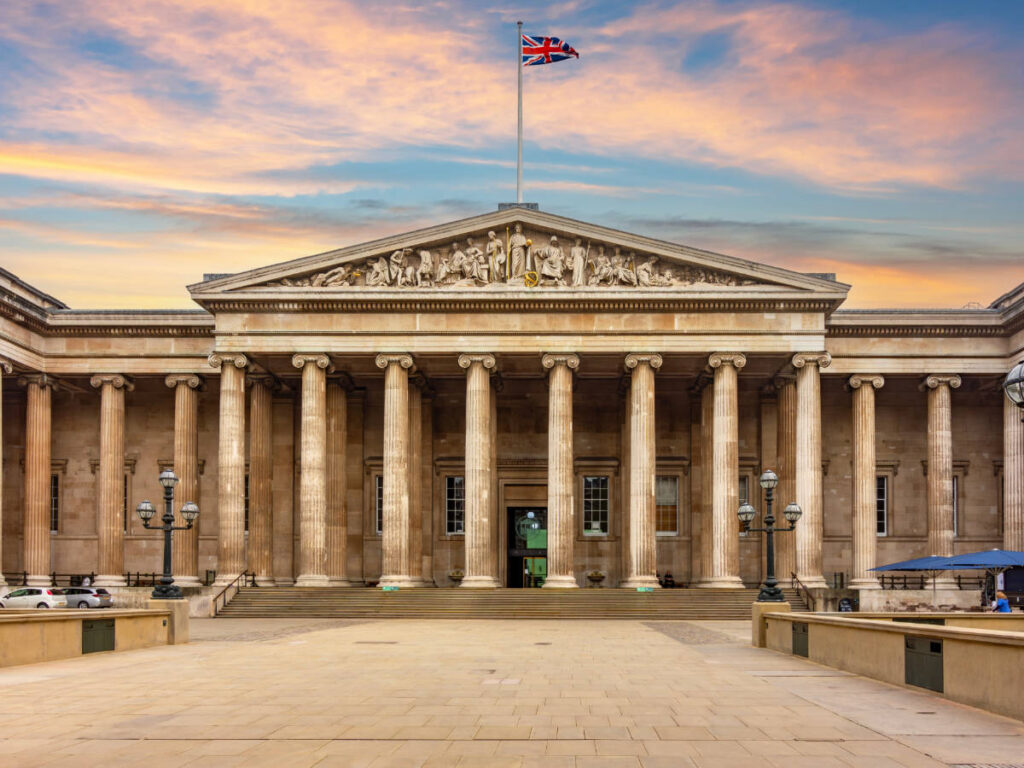 The British Museum's columned facade at dusk